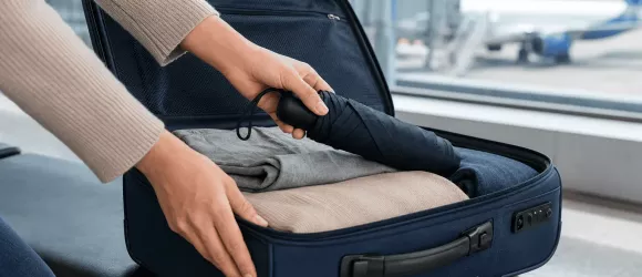 Får du ta med ett paraply på flygplan?