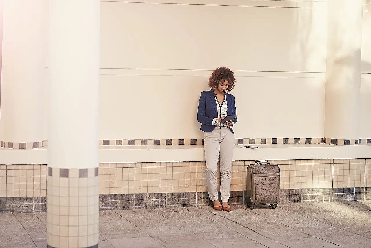 Woman at the airport after denied boarding