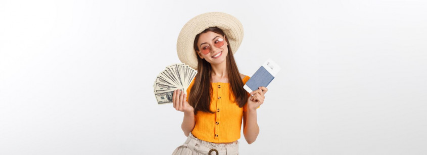 girl-with-hat-on-head-having-money-fan-and-passport