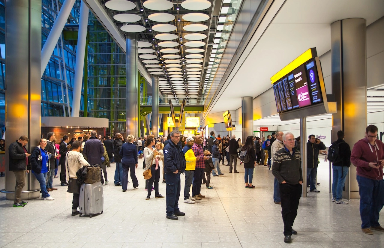 People at London Heathrow airport after BA delayed flight