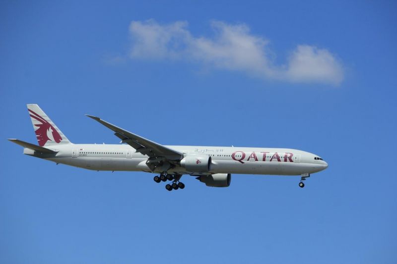 a Qatar airplane getting ready to land