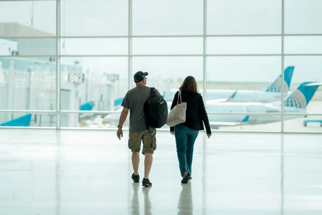 a couple of passengers at the airport