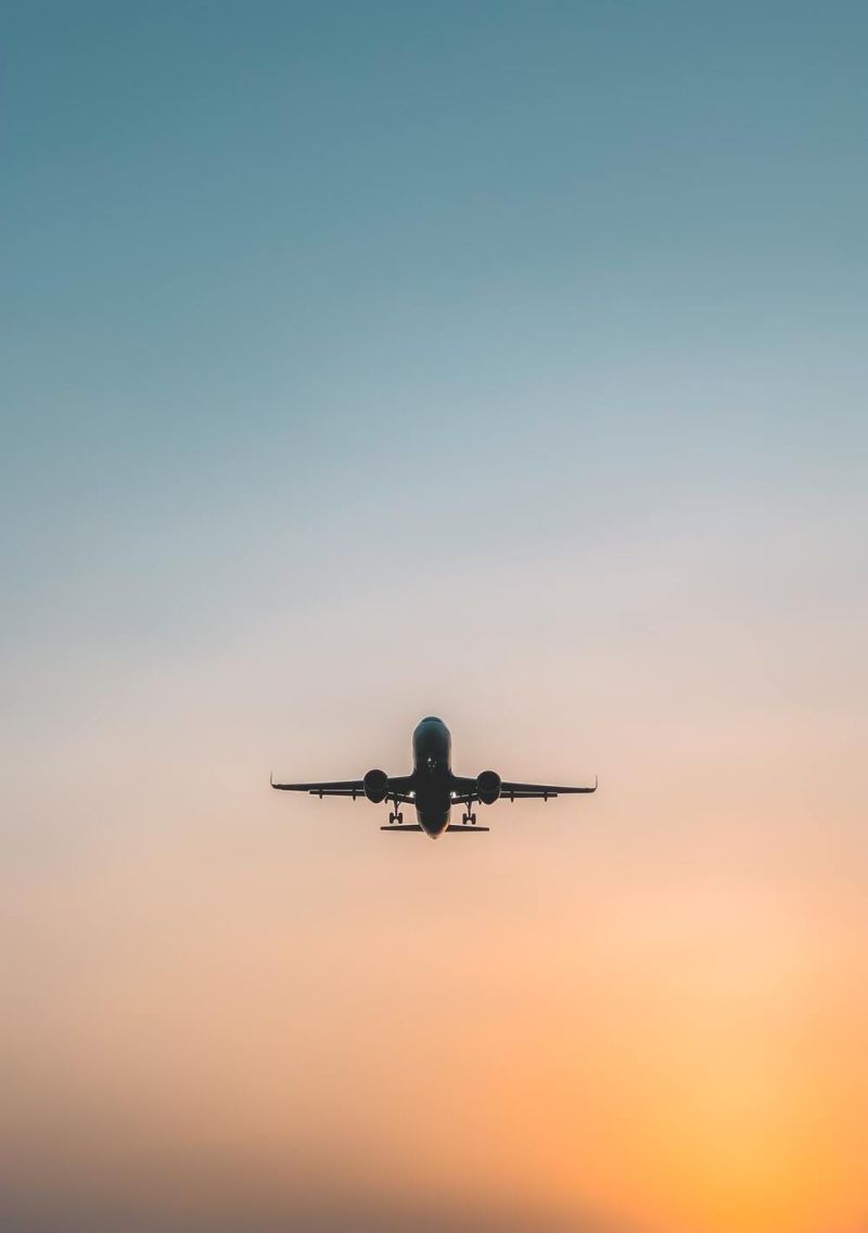 A delayed Emirates flight in mid-air above the airport