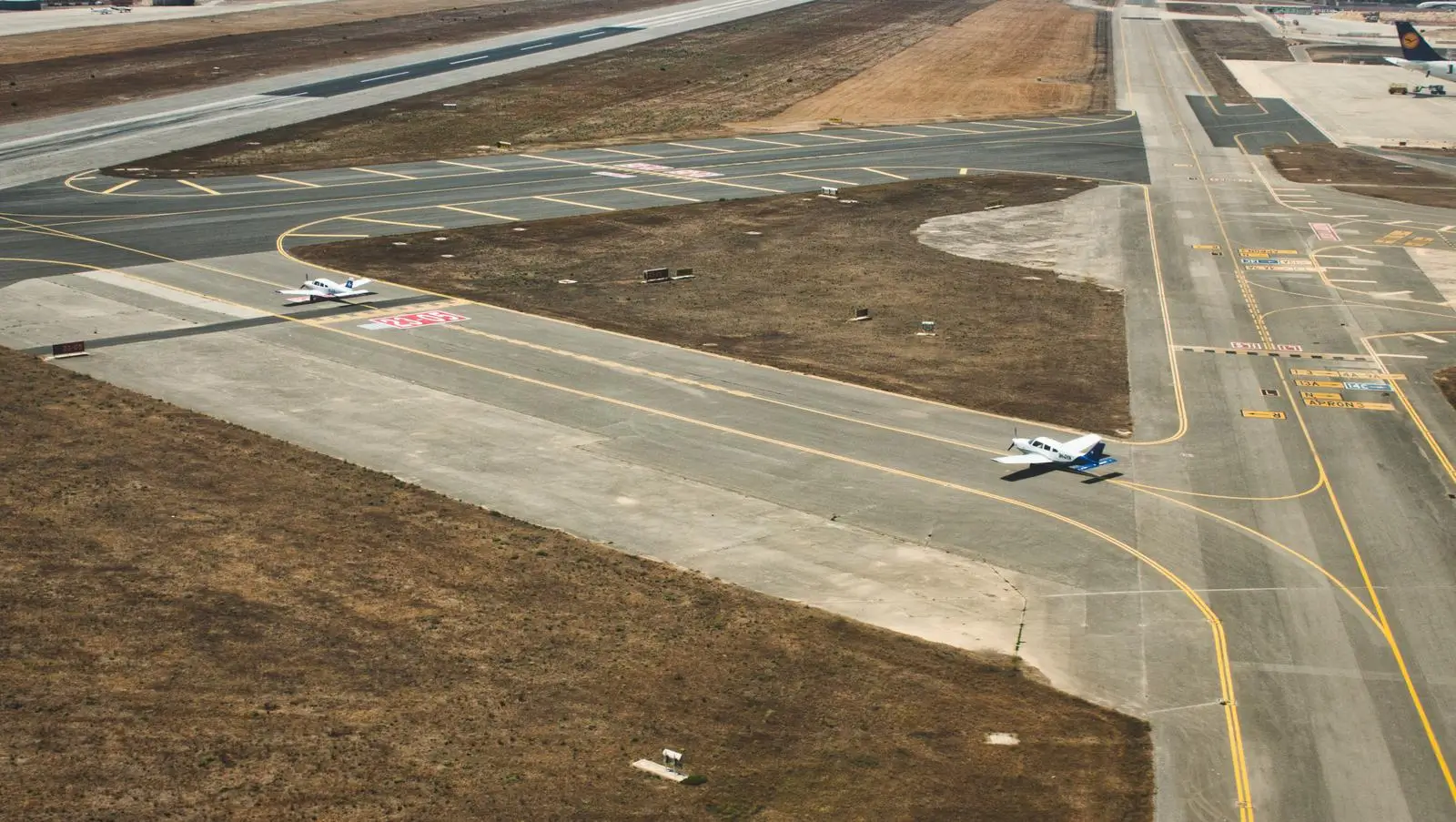 aircraft on the runway of seville airport during the day