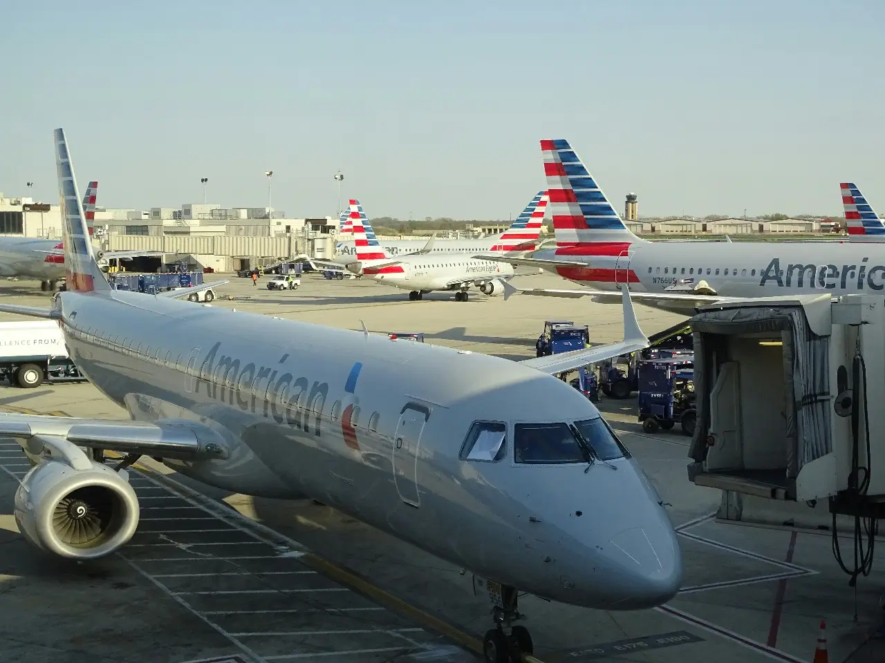 A close-up of several American Airlines planes delayed at the gate at Philadelphia International Airport