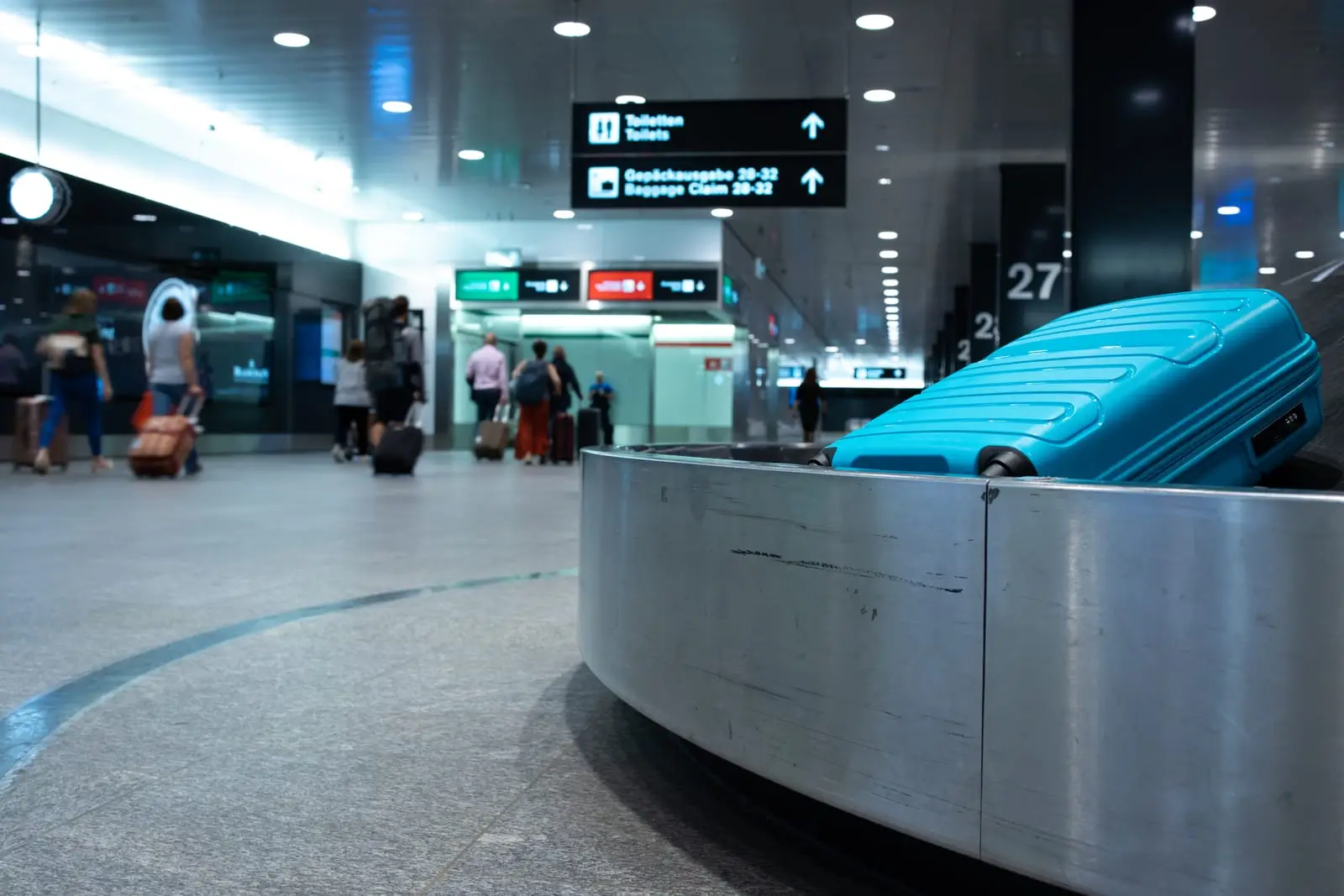 arrived luggage going around on a conveyor belt