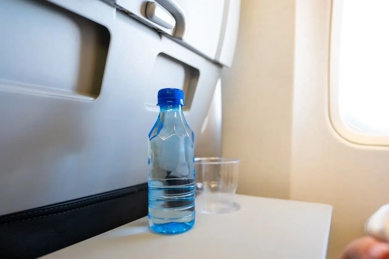 Bottle of water on a plane