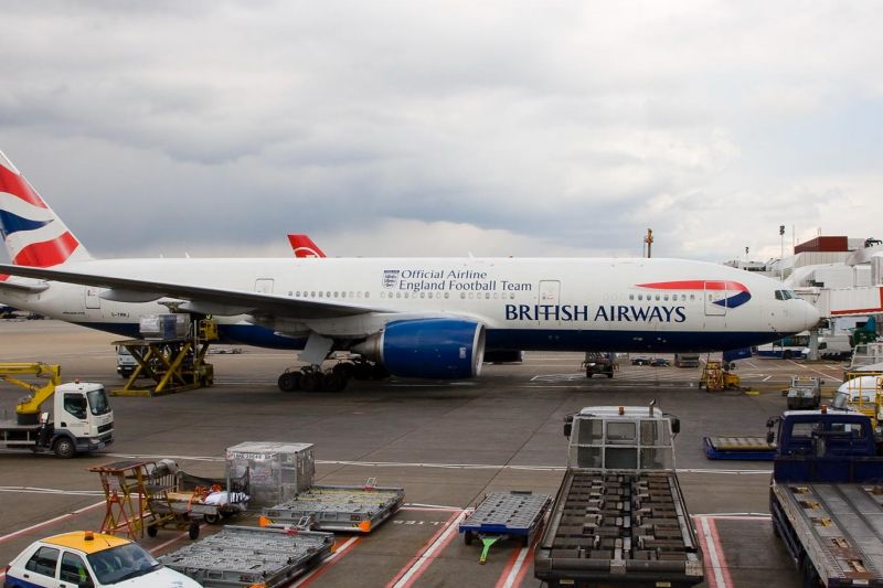 a British Airways airplane at the airport terminal