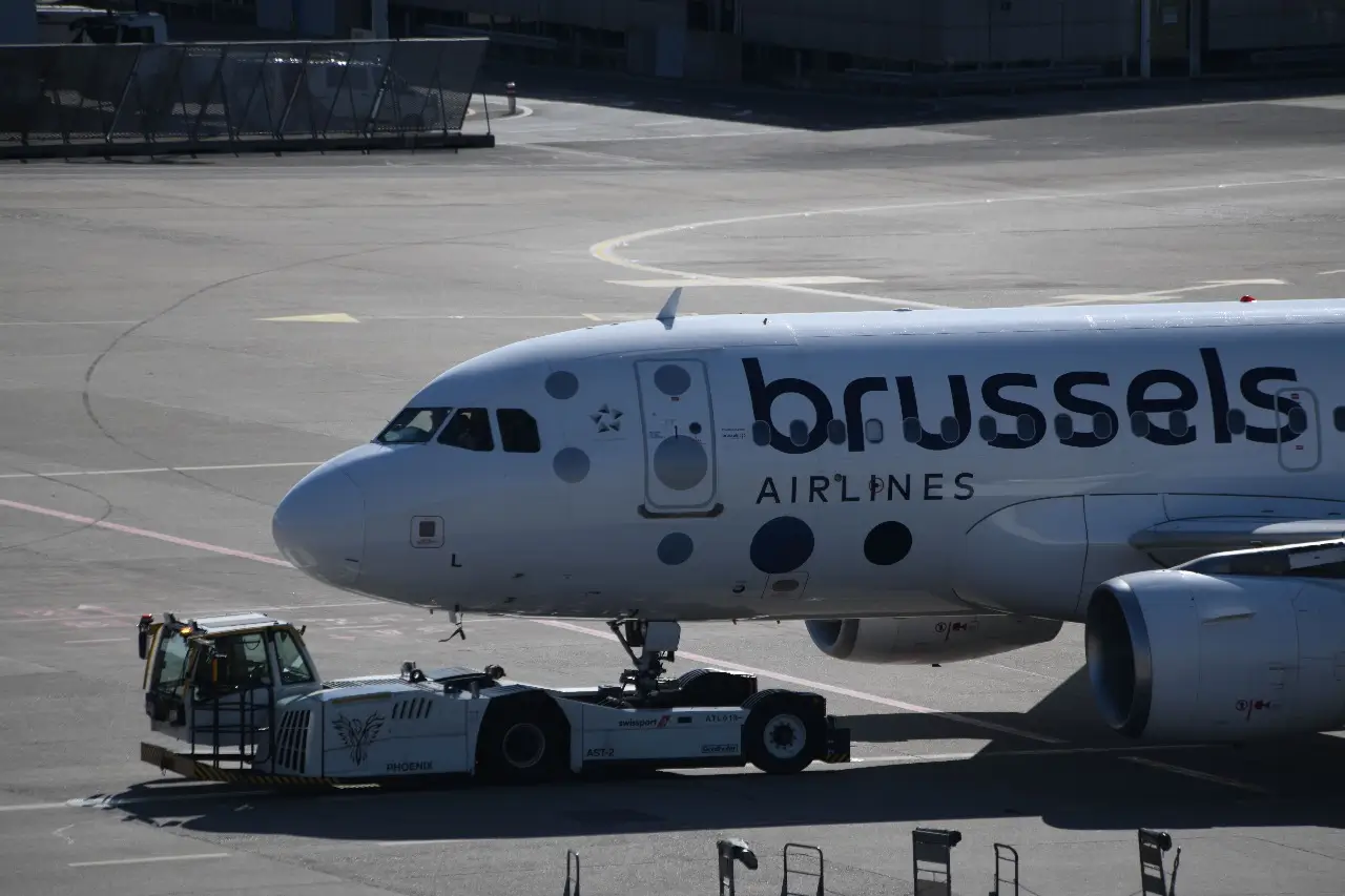 A Brussels Airlines plane being towed on the tarmac in Geneva.