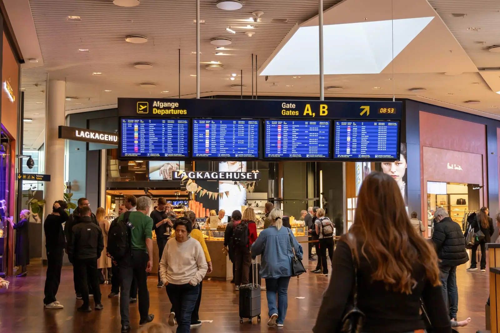 copenhagen international airport information board with flight information