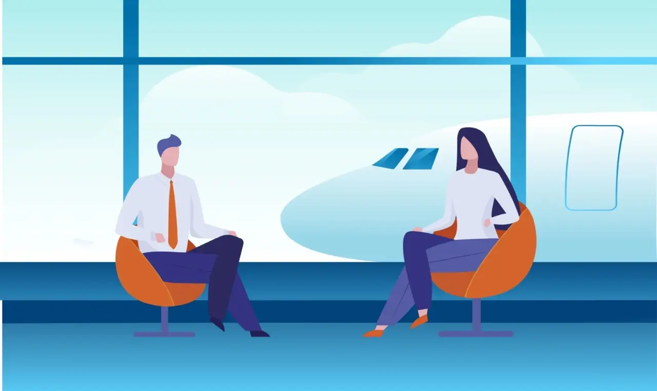 un couple attend dans le salon de l'a&eacute;roport