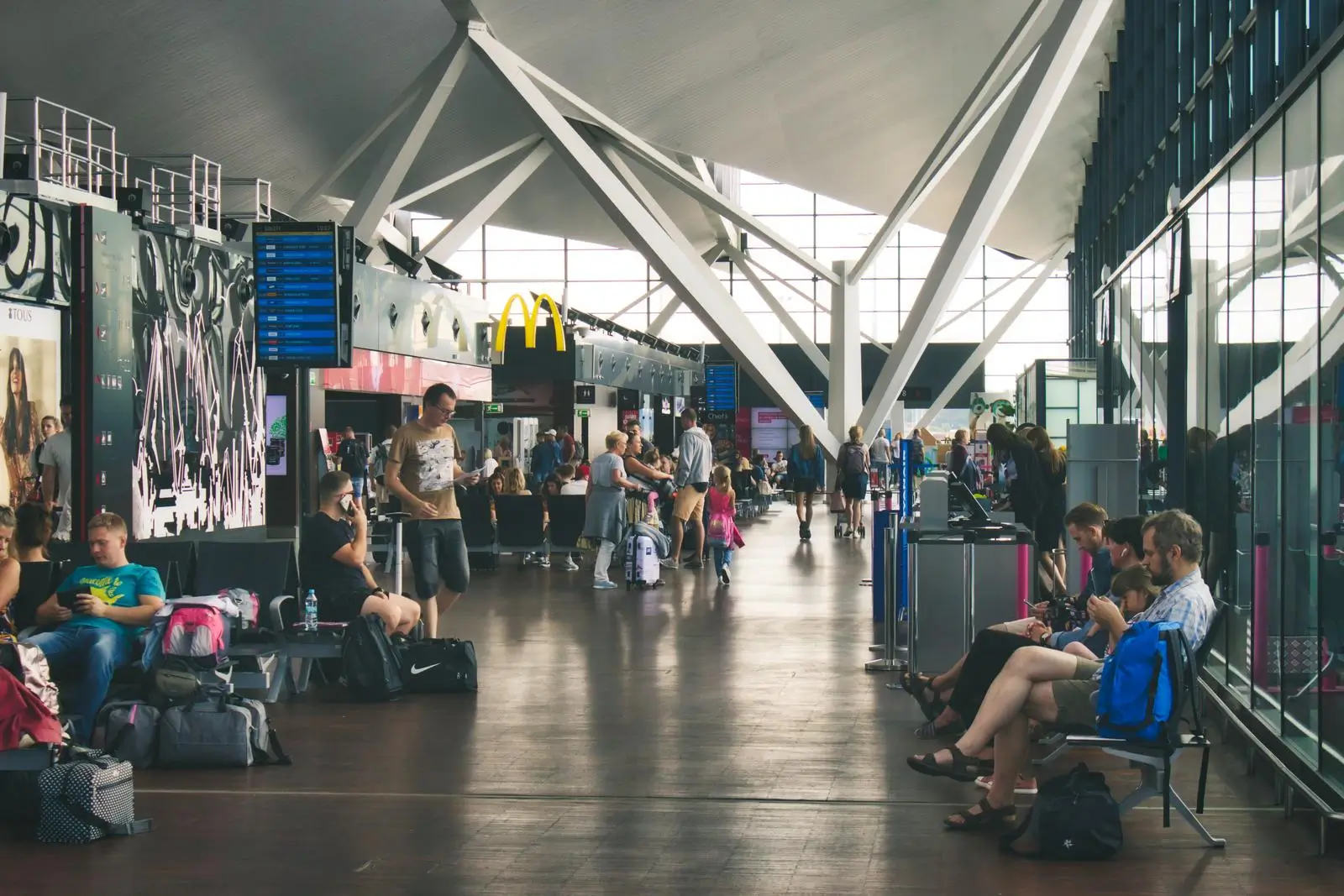 crowded departure lounge at gdansk airport