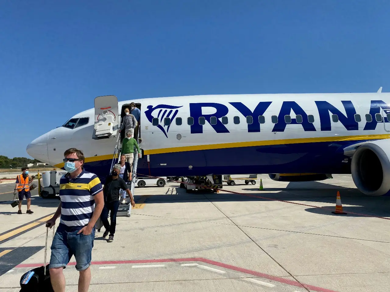 Delayed passengers deplaning at Palma de Mallorca Airport