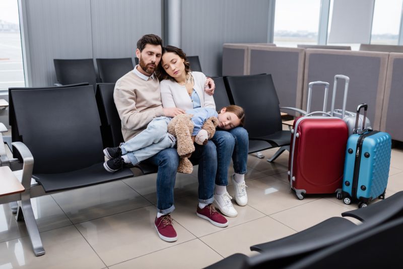 Tired family at airport