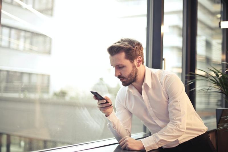 Man is checking how much money he can claim in flight compensation form