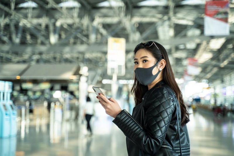 Passenger waiting for a new flight after a Loganair flight cancellation