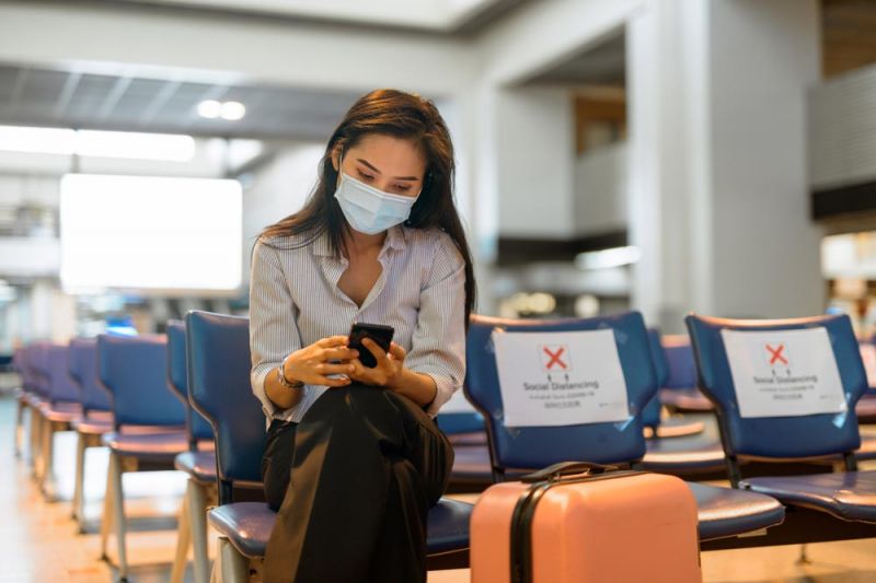 Passenger waiting for a new flight after a Royal Air Maroc flight cancellation