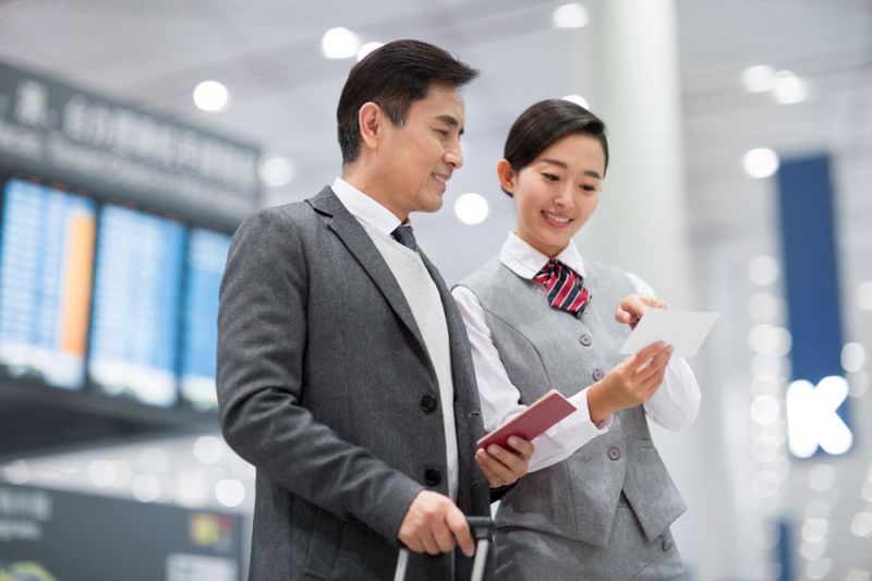 Passenger and stewardess discussing a Eurowings cancelled flight