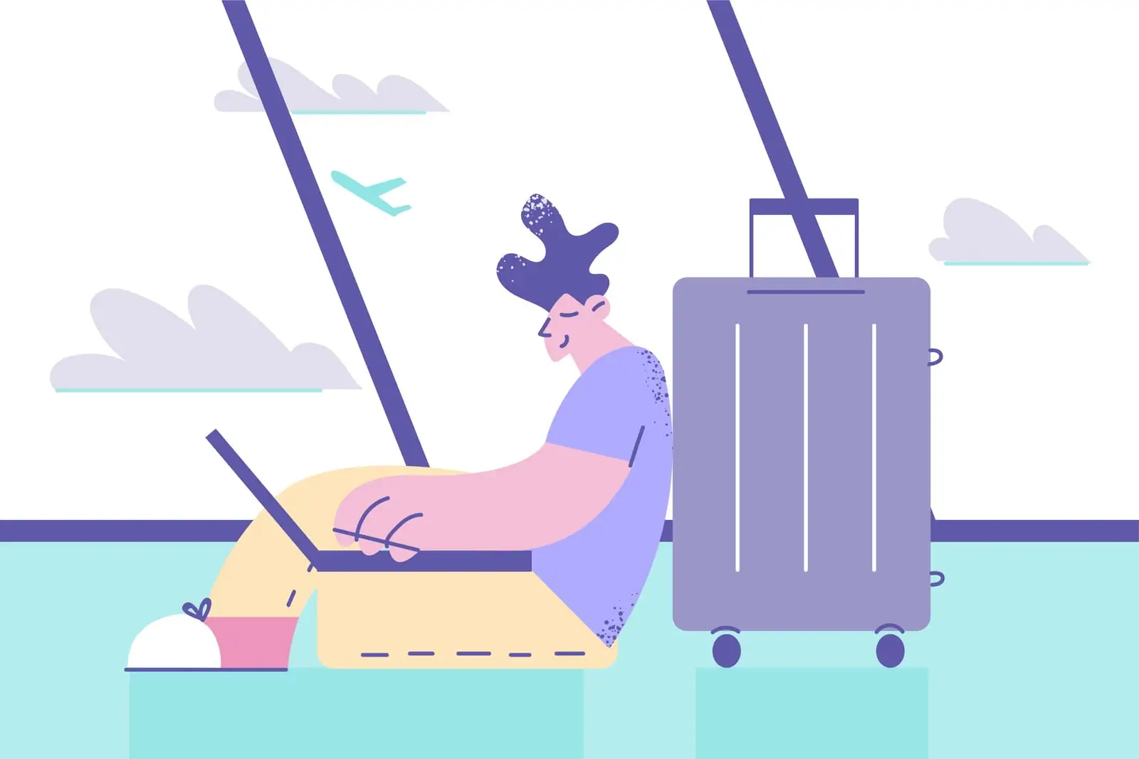 passager utilisant son ordinateur portable en attendant son avion
