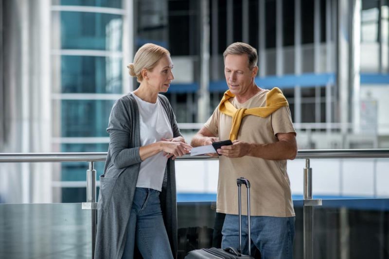 Two passengers discuss Virgin Atlantic delay compensation