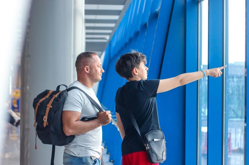 Passengers waiting after flight delays in Amsterdam Airport