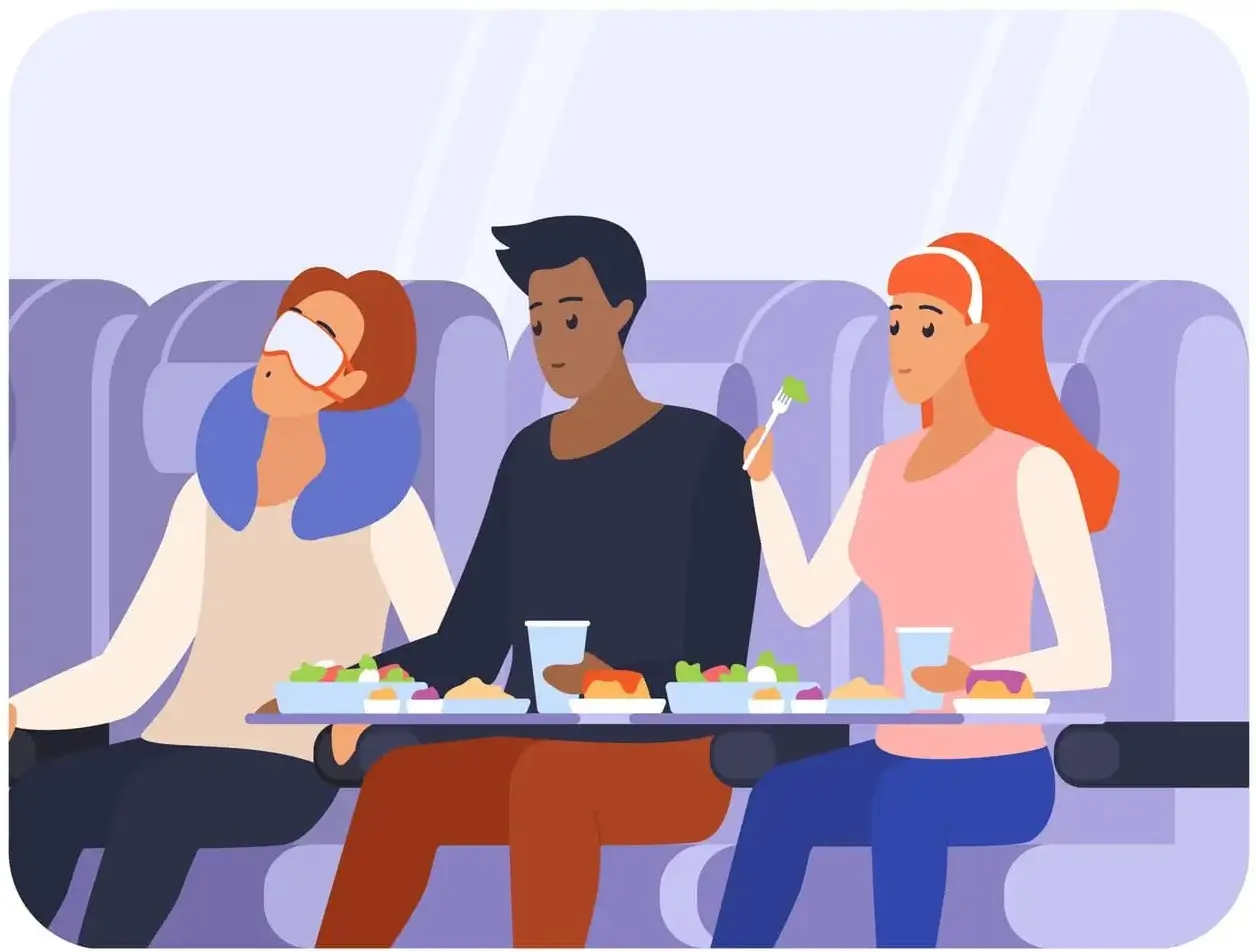passagers mangent de la nourriture sur des plateaux