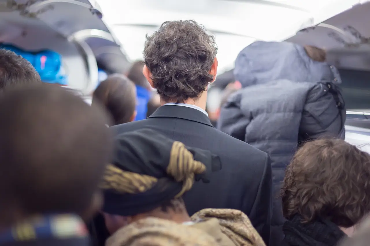 A queue on a plane after landing