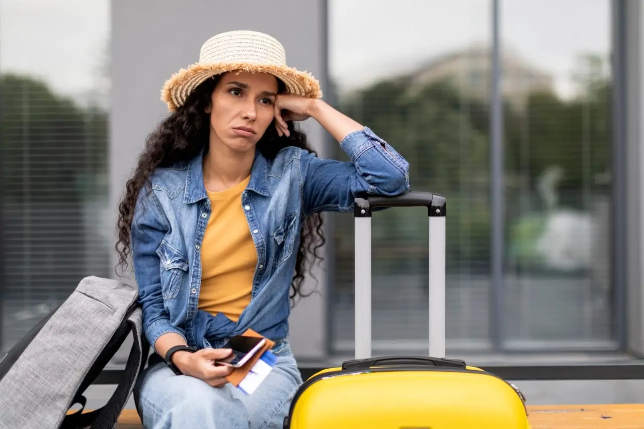 upset young woman was denied boarding