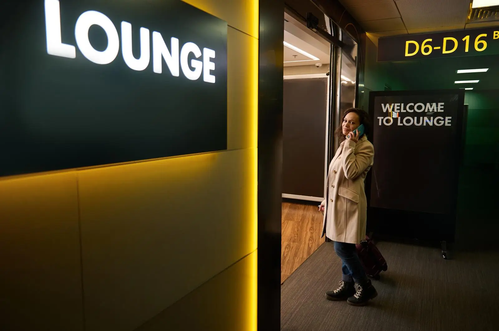 woman at the entrance to the airport lounge