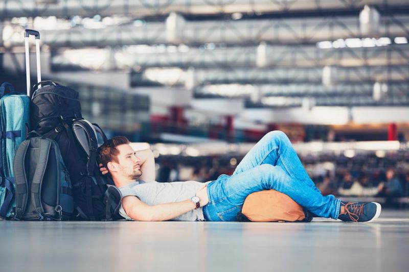 Young man waiting after claiming an Iberia delay compensation