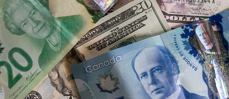 a pile of Canadian money