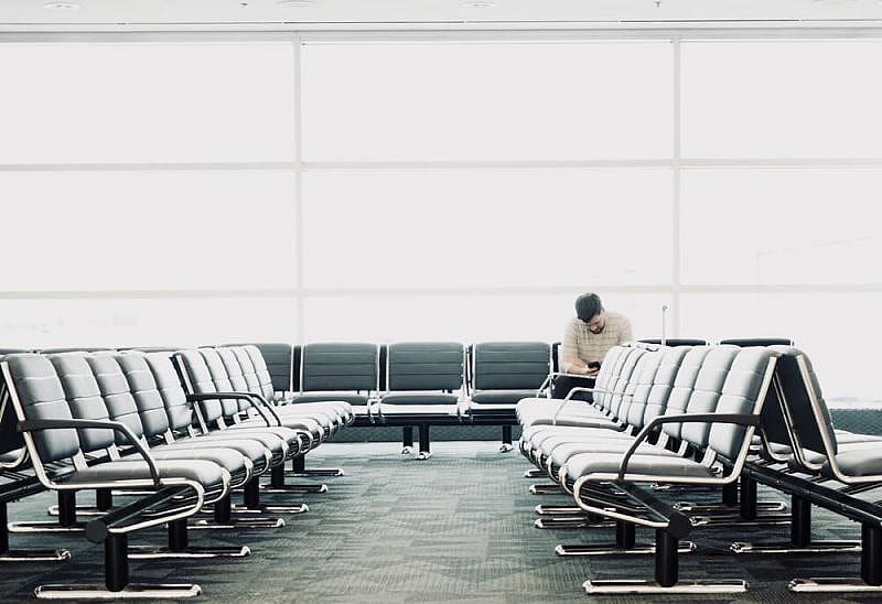 air passenger in the airport is thinking to apply for flight cancelled compensation Ireland