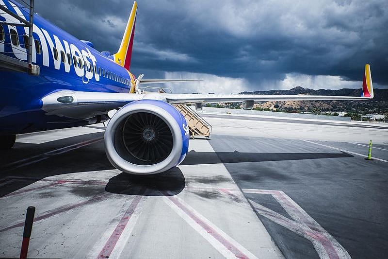 southwest plane wing view while boarding airplane on front door
