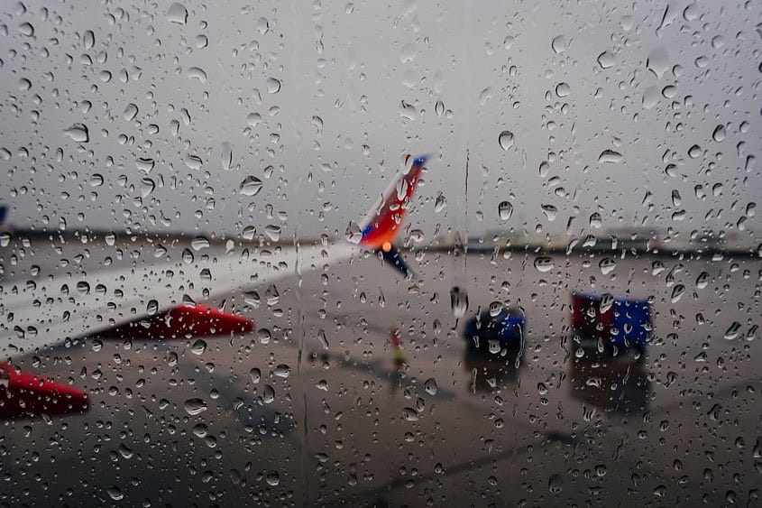 Rain drops on a plane window