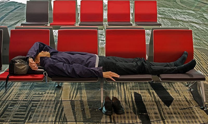 Traveller napping due to jet lag