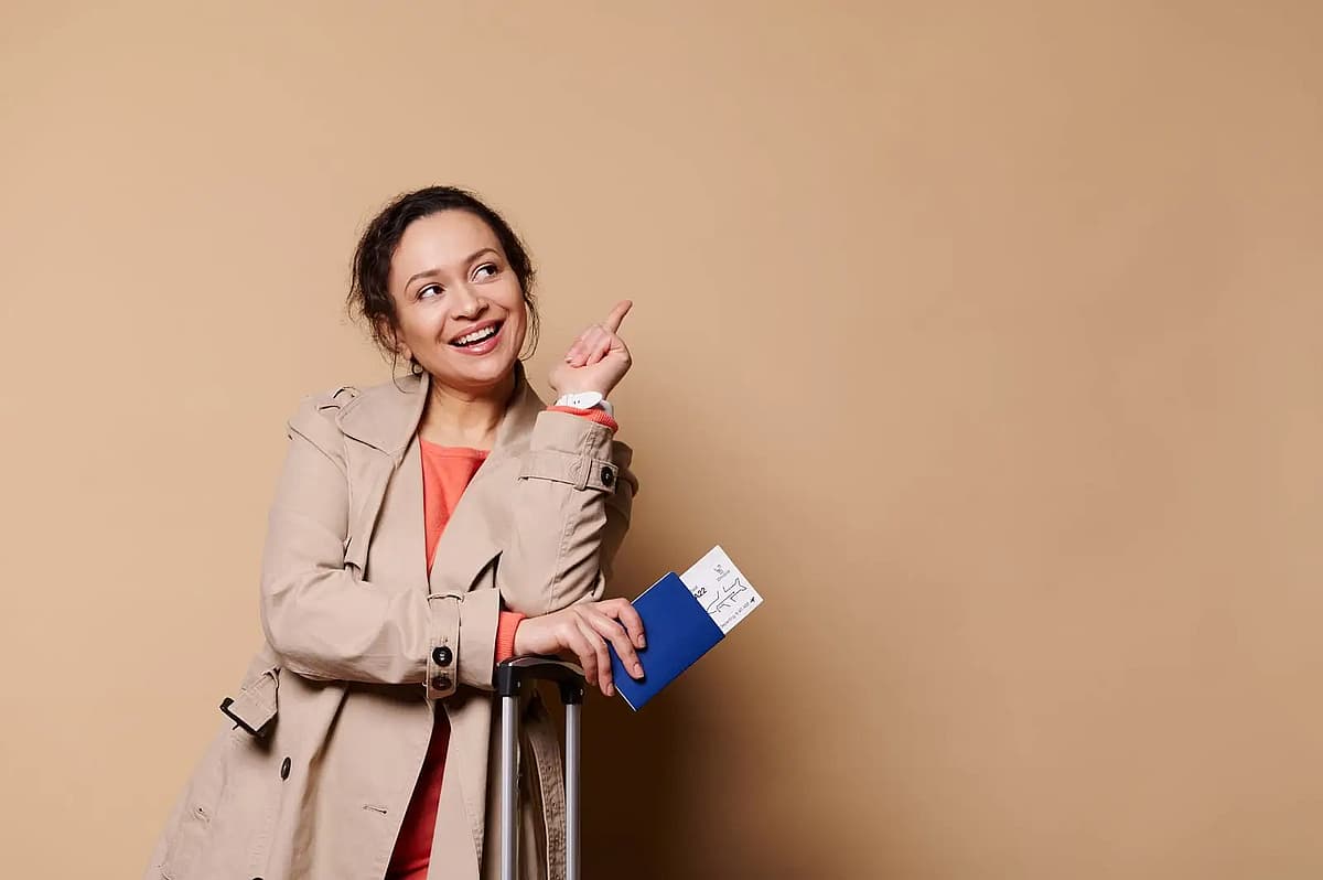 passenger with boarding pass in hands